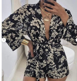 FLORAL SHORT JUMPSUIT (BLACK)
